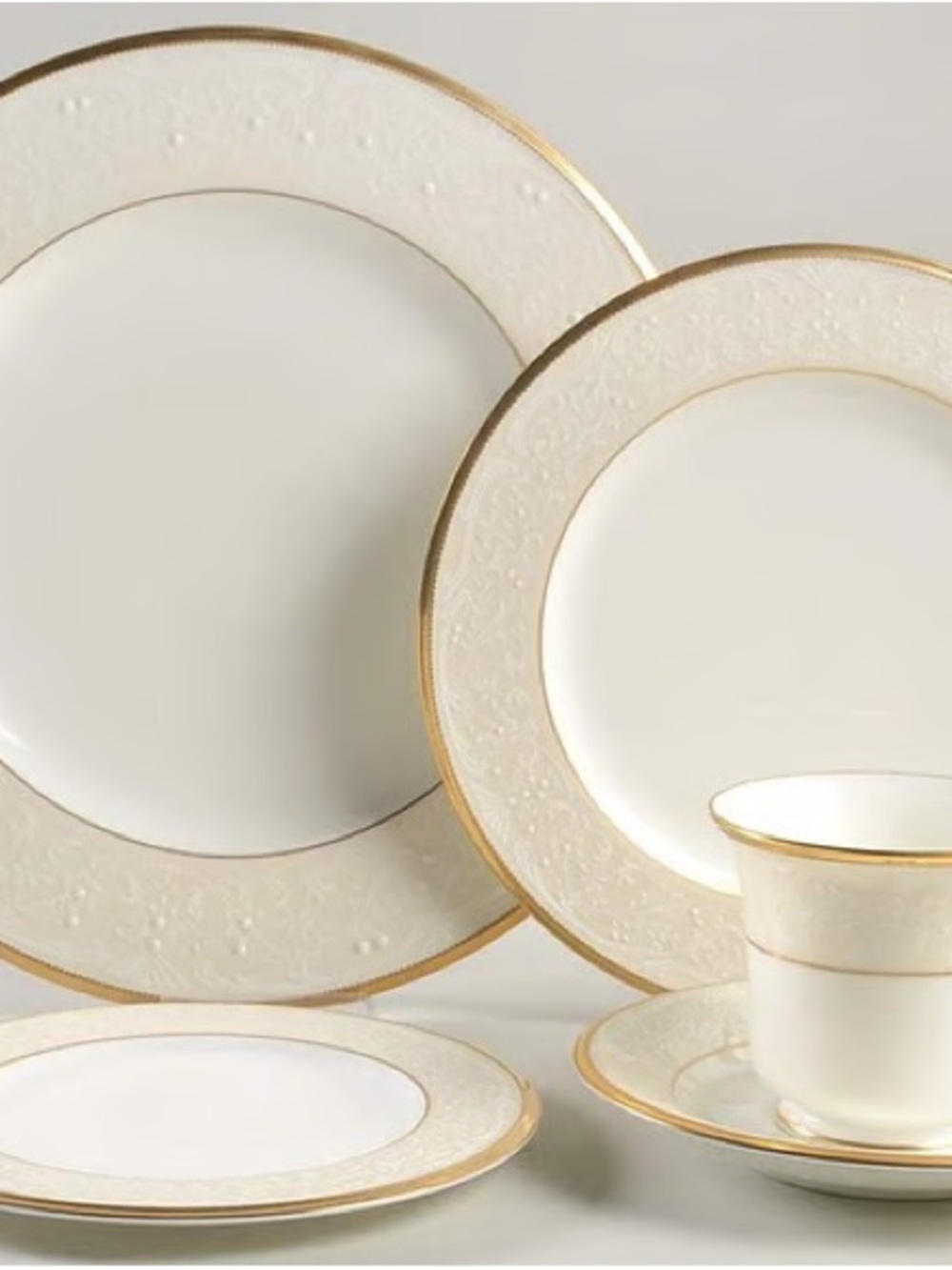 Noritake Cream Porcelain Dinnerware with Gold Rim